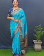 Breathtaking Firozi Banarasi Silk Saree With Proficient Blouse Piece