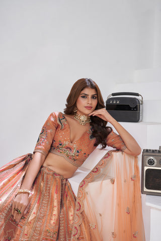 Rust Opulent Aura Raw Silk Bridal Lehenga With Peacock And Paisley Motifs
