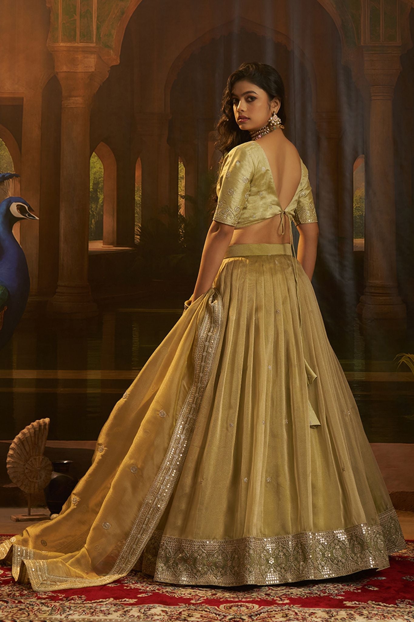 Premium Olive Green Hiranya Silk Lehenga Set Featuring Art Silk Blouse And Detailed Embroidered Dupatta