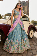 Grand Teal Blue Rangoli Silk Wedding Wear Embroidered Lehenga Set
