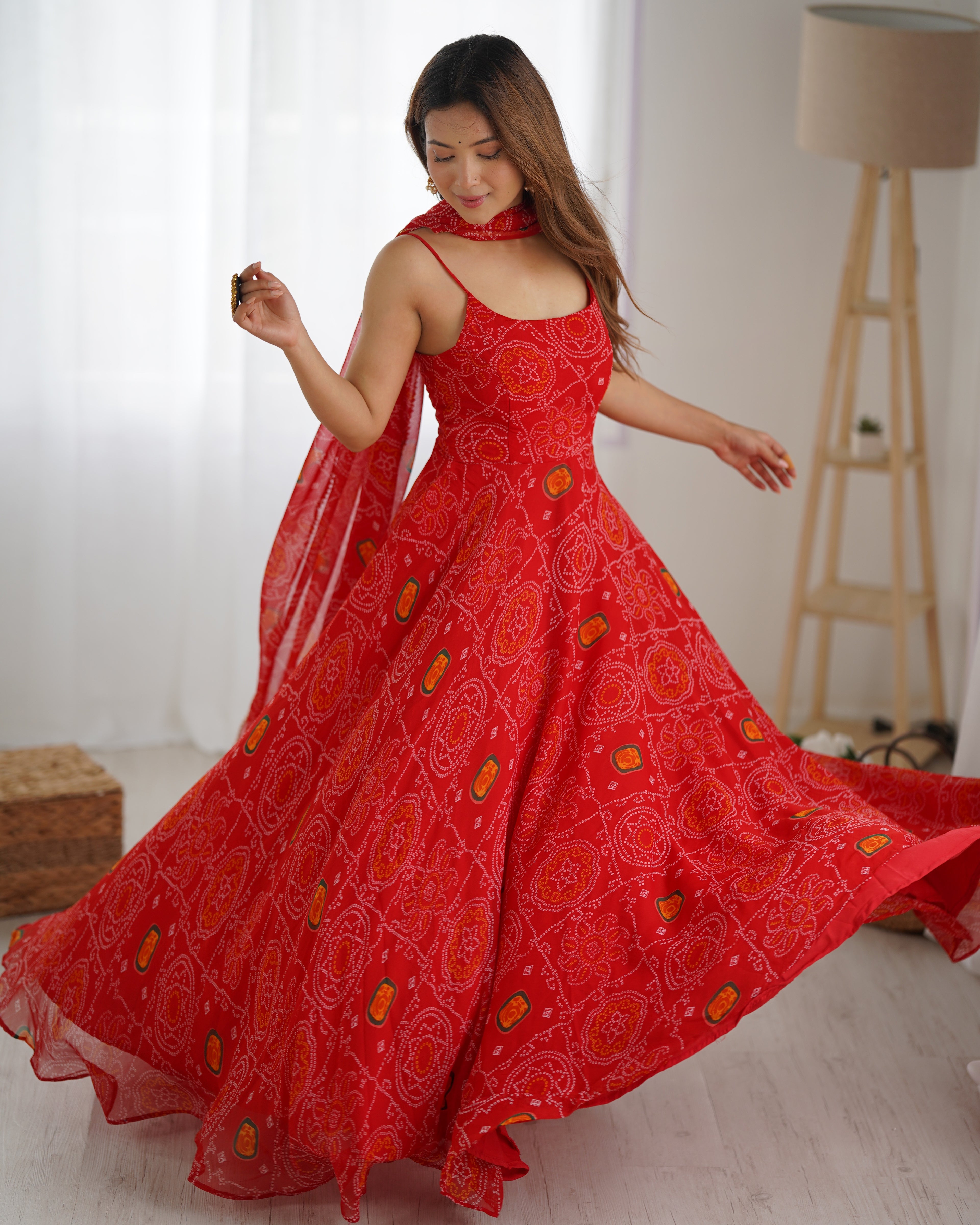
Designer Soft Chiffon Bandhej Fully Flared Gown Set