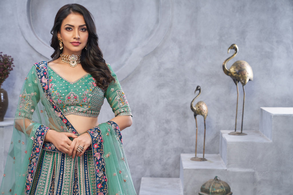 Green Banarasi Silk Temple Motif Bridal Lehenga Choli with Soft Net Dupatta
