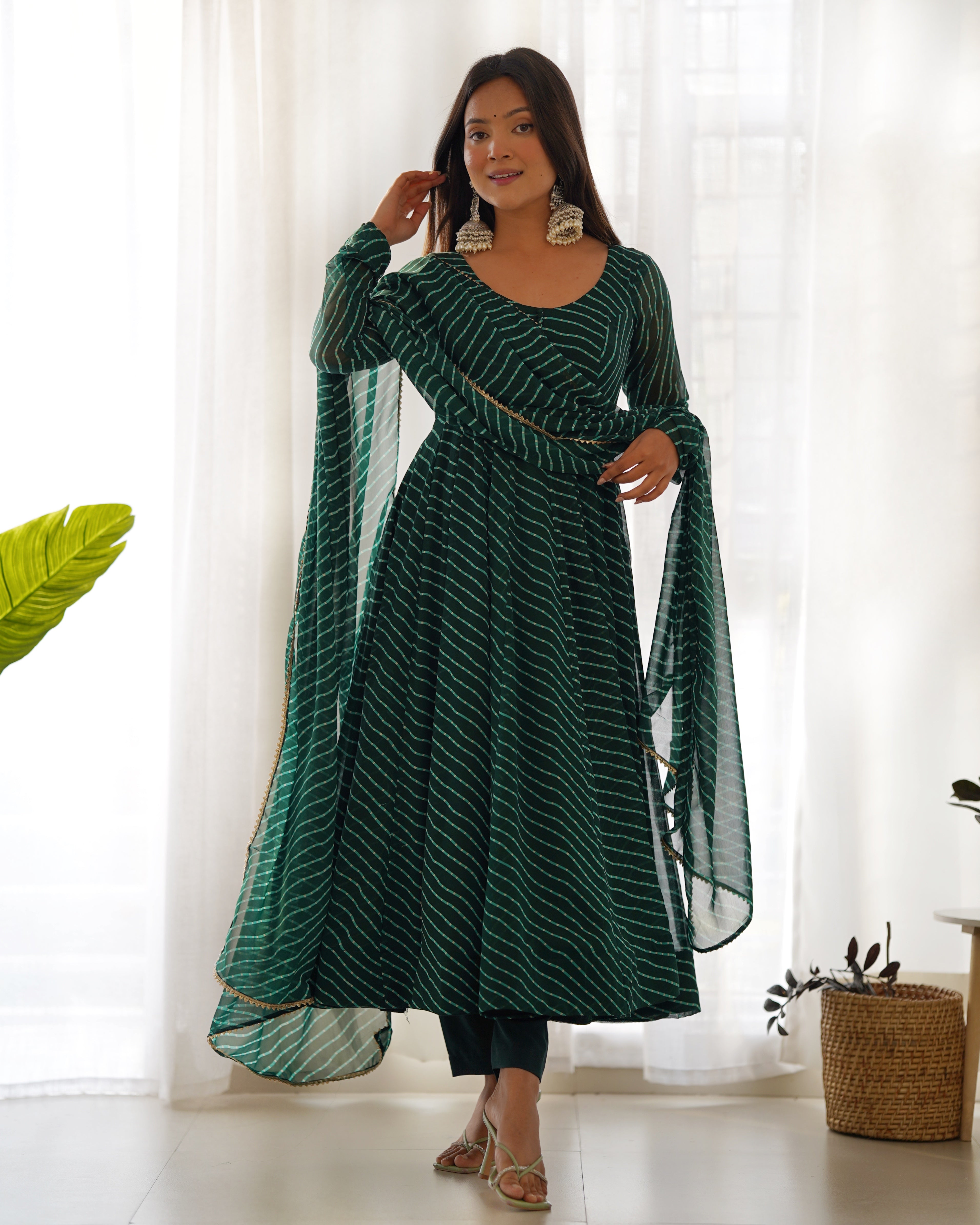
Green Pure Soft Faux Georgette Leheriya Anarkali Suit With Huge Flair Comes With Duppatta & Pant
