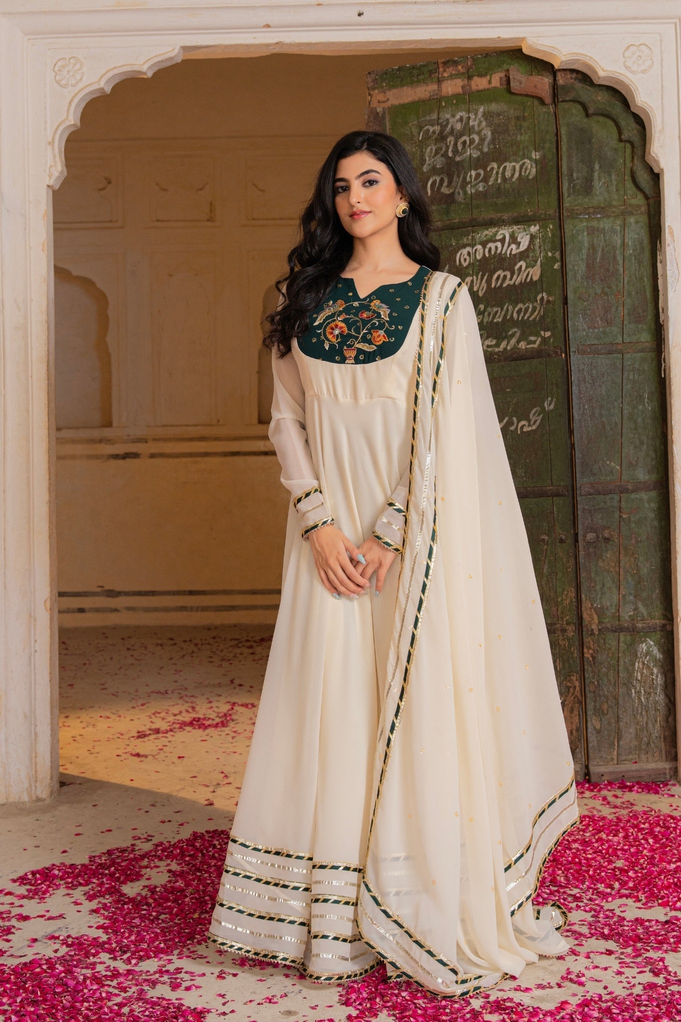 Royal Ivory Flow Anarkali Featuring Emerald Hand Embroidered Detail