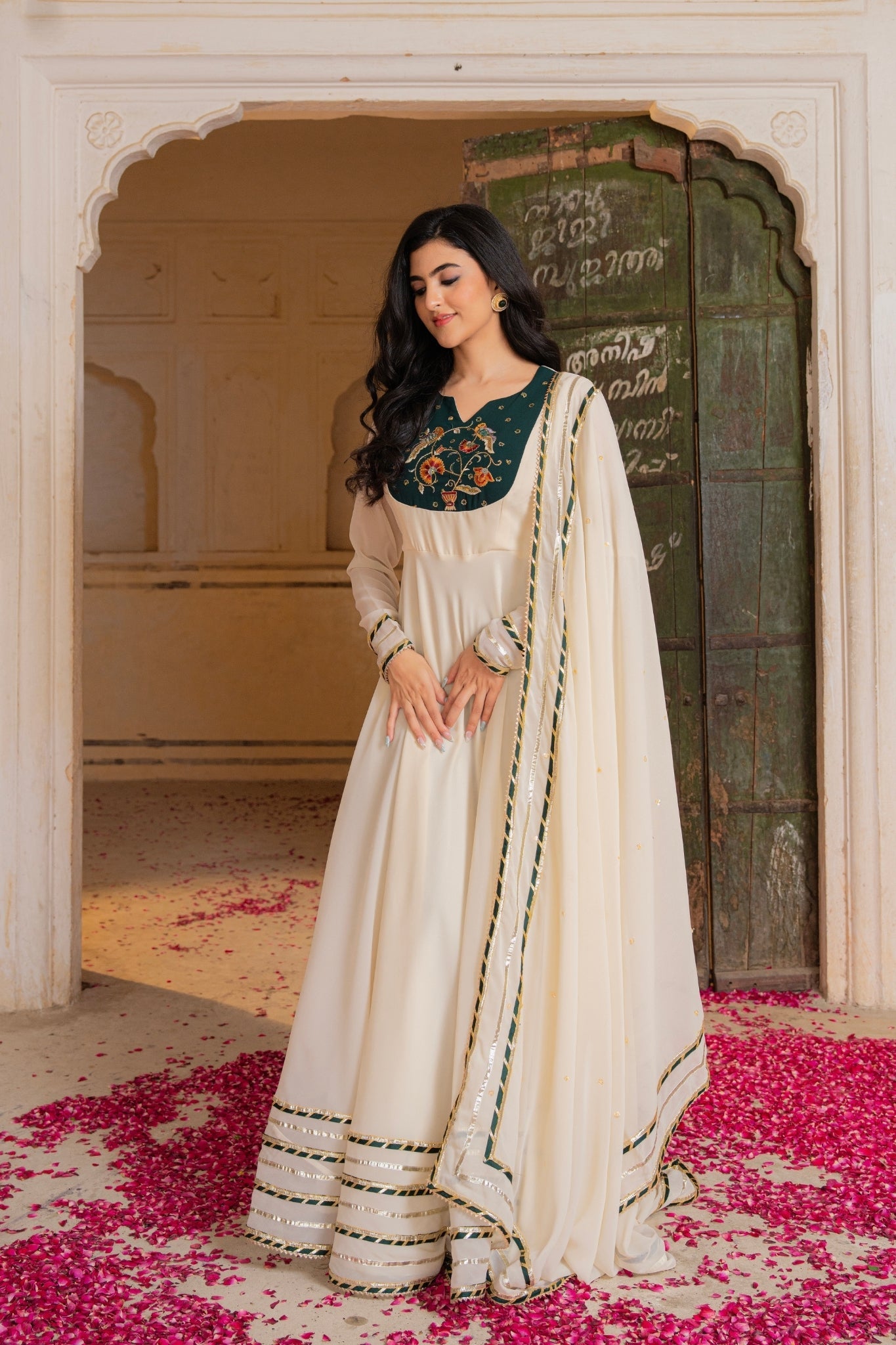 Royal Ivory Flow Anarkali Featuring Emerald Hand Embroidered Detail