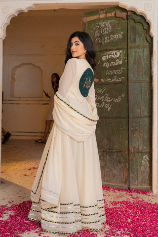 Royal Ivory Flow Anarkali Featuring Emerald Hand Embroidered Detail