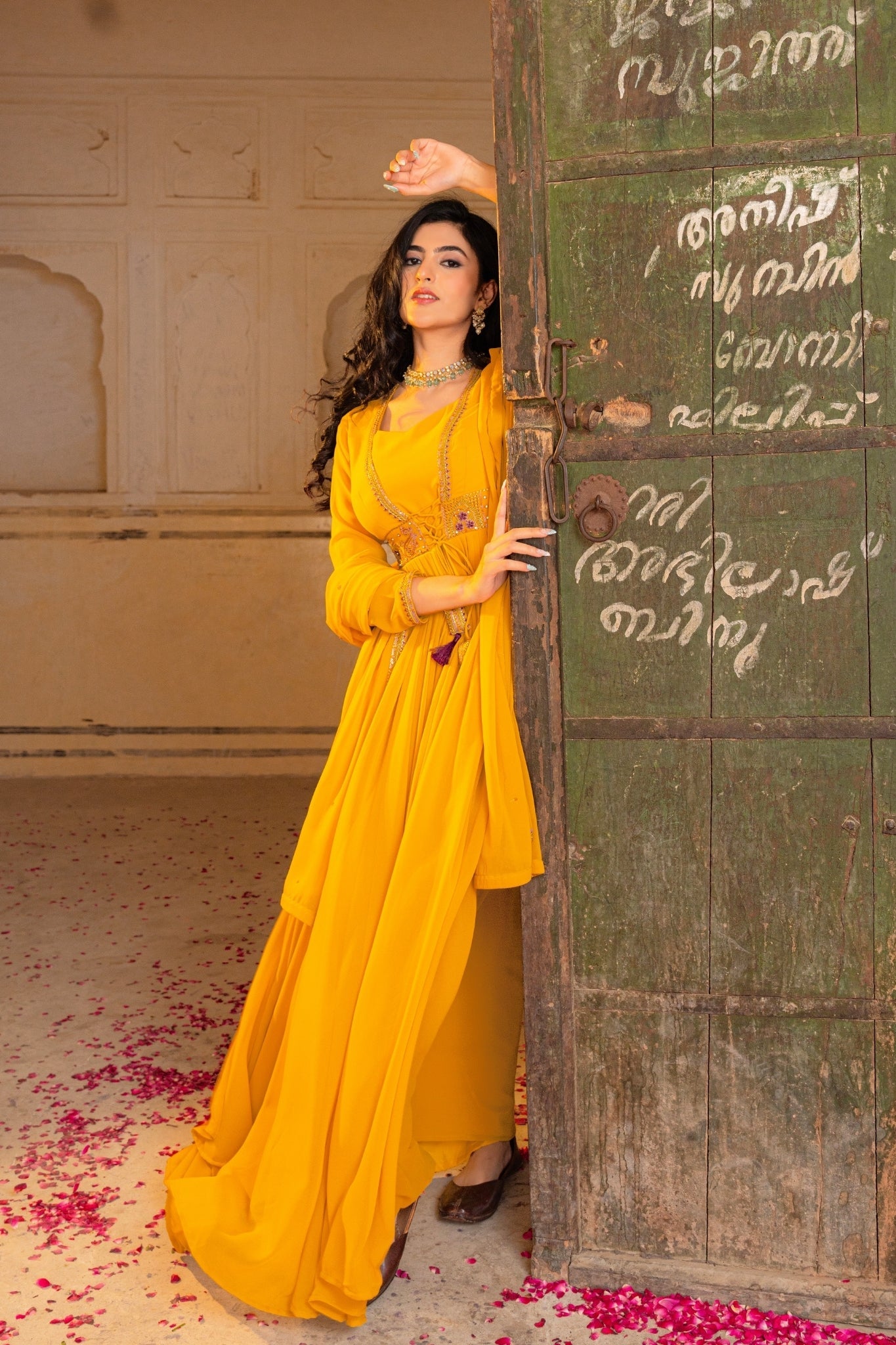 Regal Mustard Georgette Anarkali Adorned With Intricate Embroidery