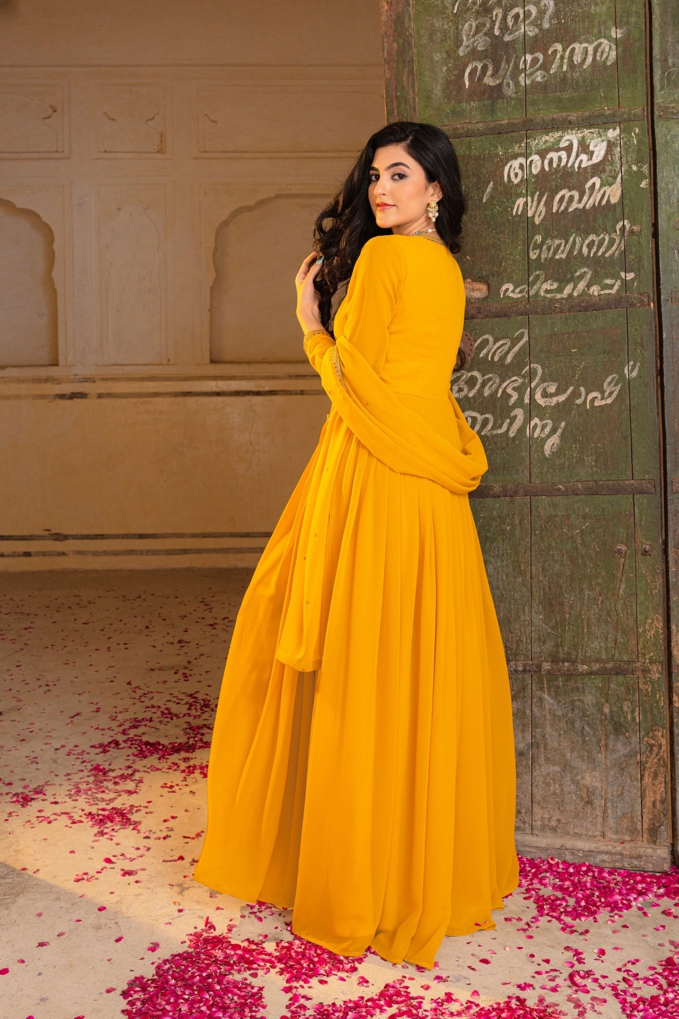 Regal Mustard Georgette Anarkali Adorned With Intricate Embroidery
