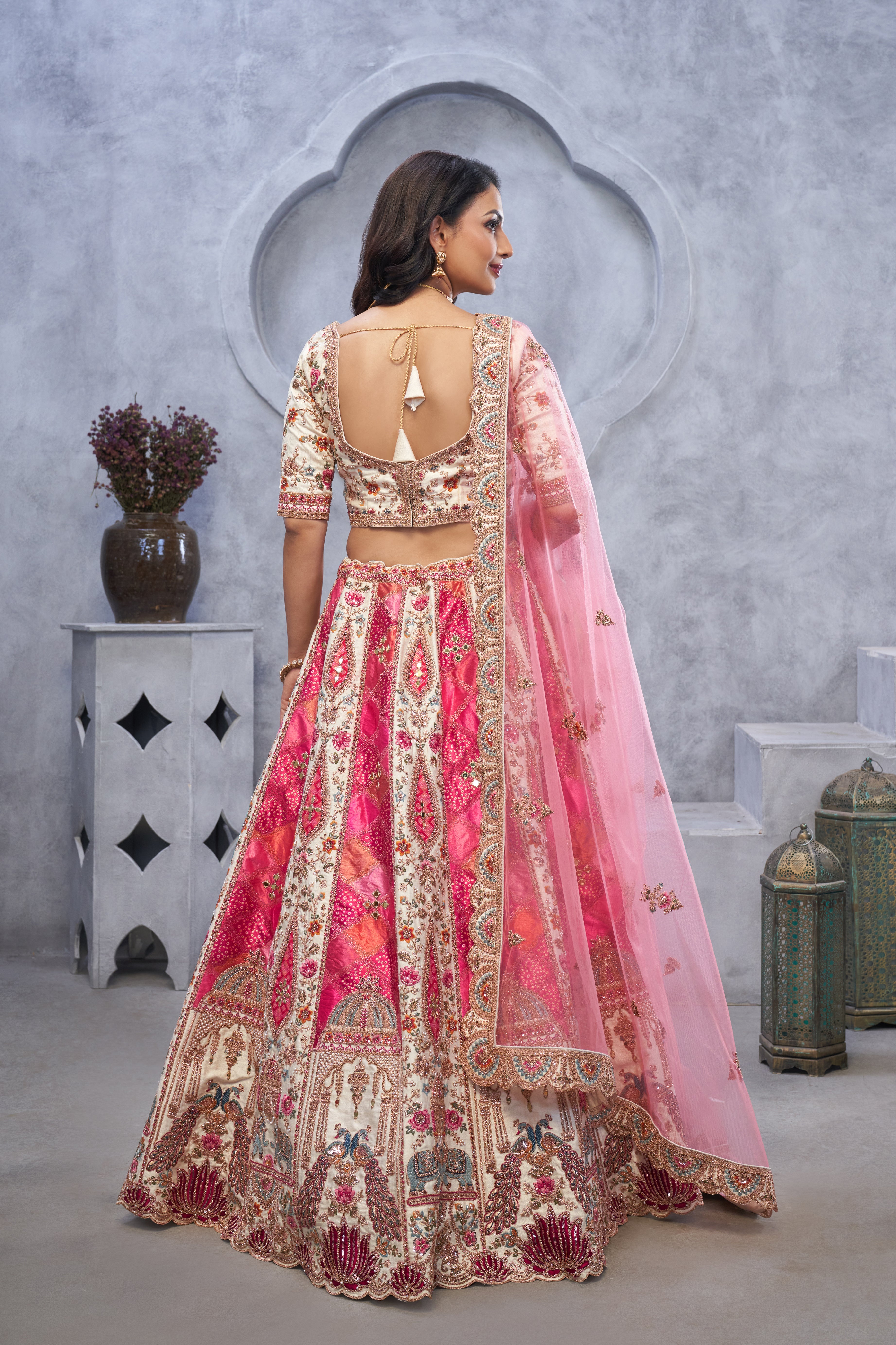 Pink Bridal Lehenga with Temple & Peacock Motifs
