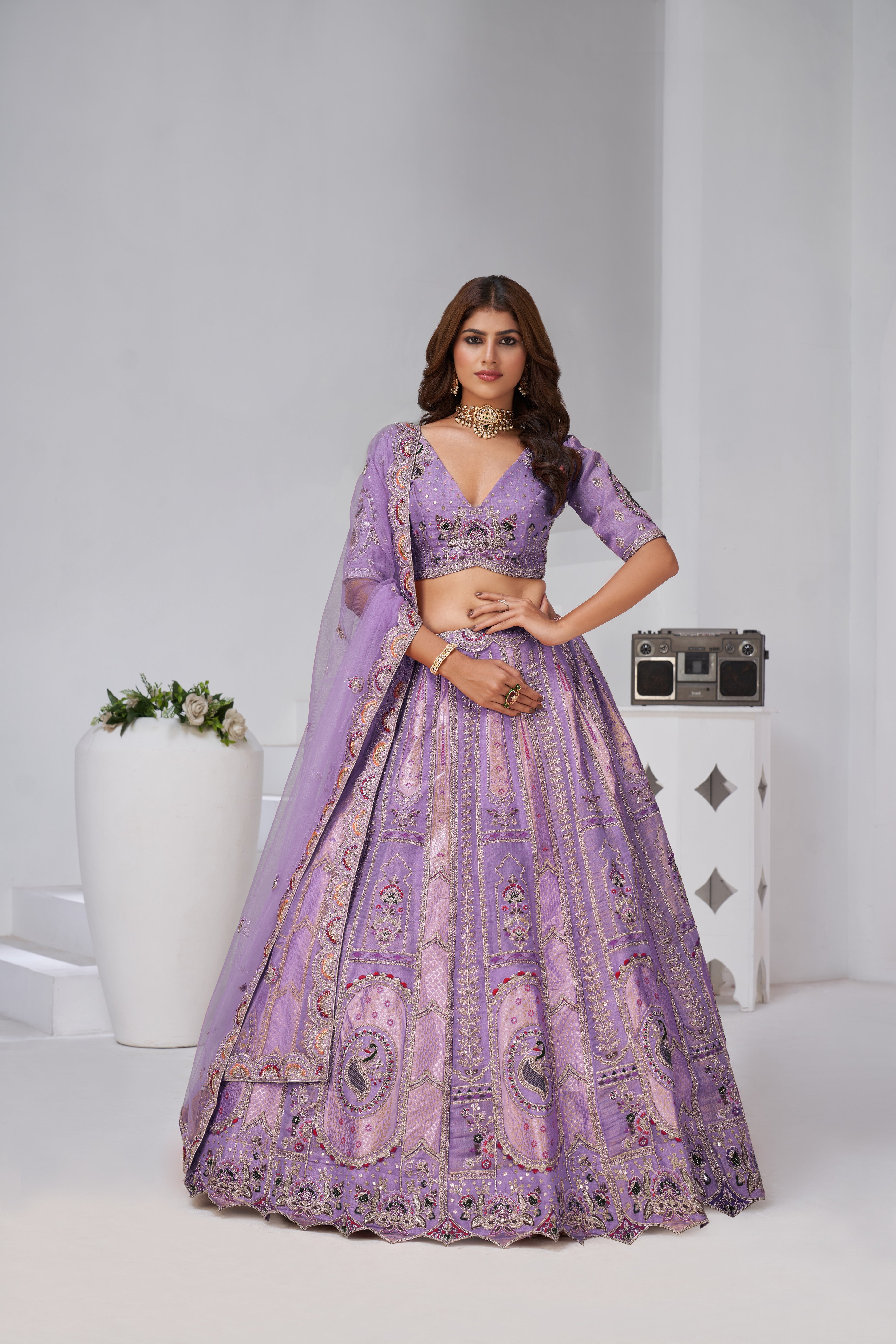 Purple Opulent Aura Raw Silk Bridal Lehenga With Peacock And Paisley Motifs
