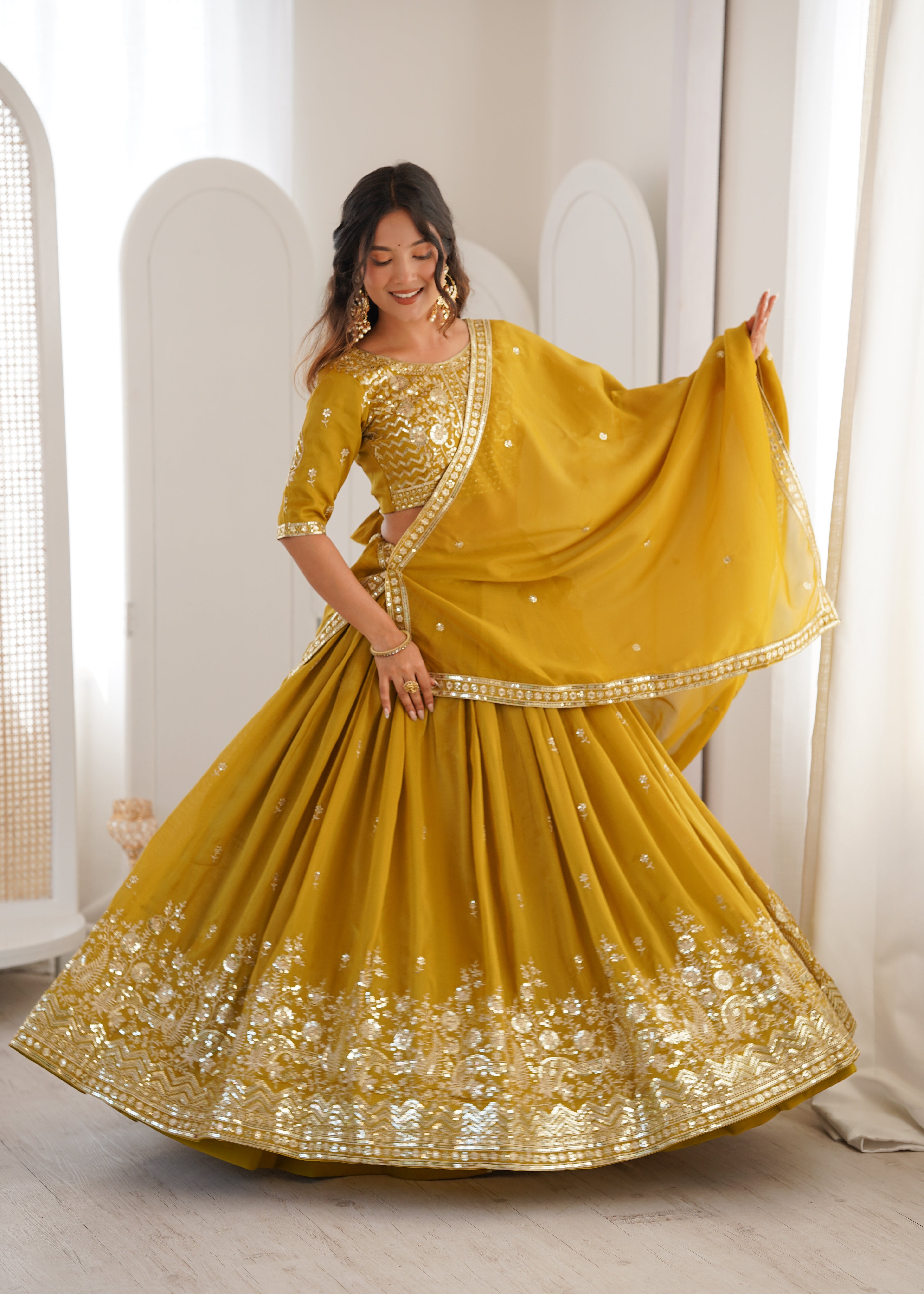 Ethnic Yellow Shimmer Silk Thread Sequence Work Lehenga Choli Set
