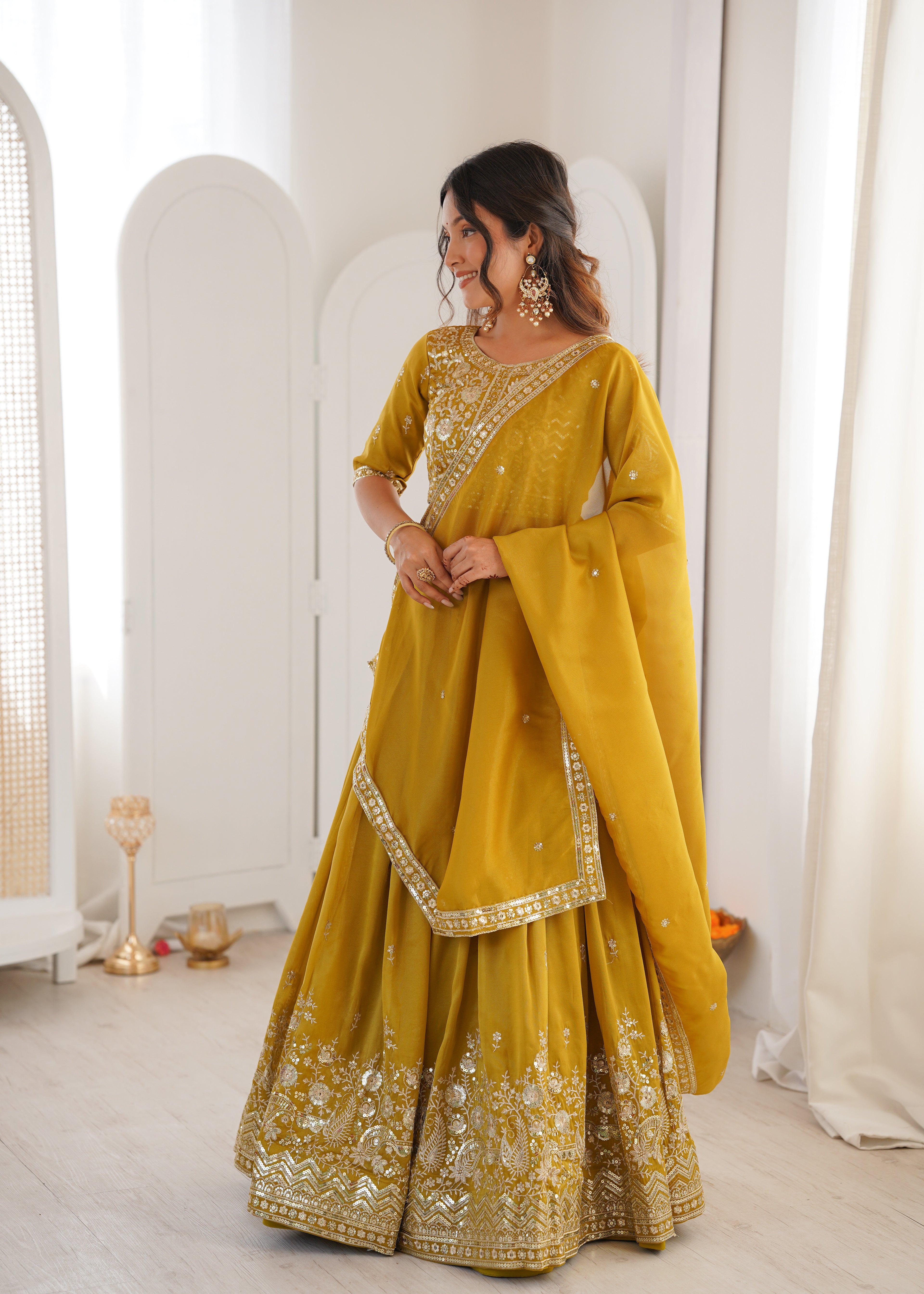 Ethnic Yellow Shimmer Silk Thread Sequence Work Lehenga Choli Set
