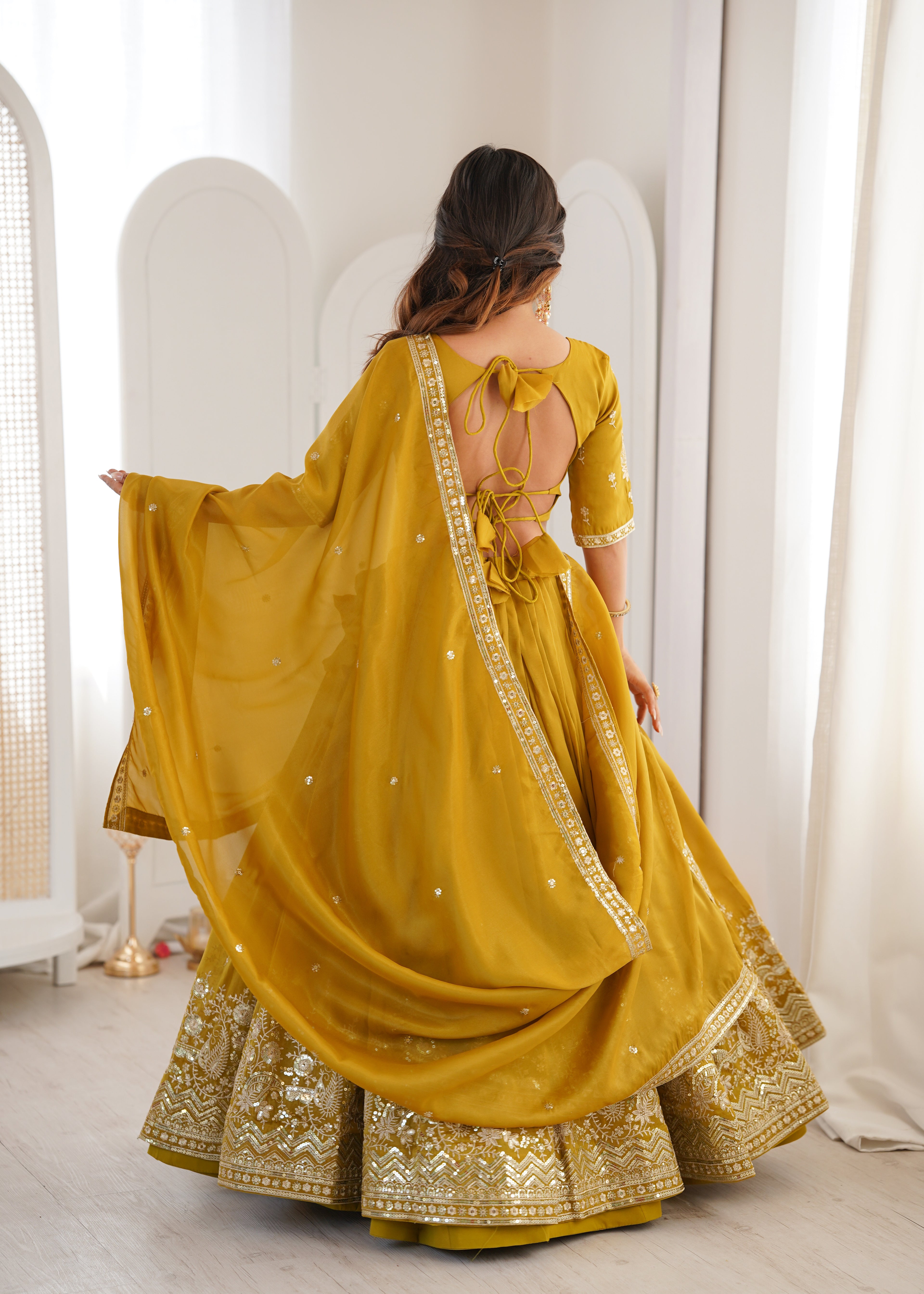 Ethnic Yellow Shimmer Silk Thread Sequence Work Lehenga Choli Set
