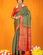 Stunning Dark Green Kanjivaram Silk Saree With Moiety Blouse Piece