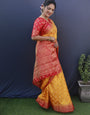 Assemblage Yellow Banarasi Silk Saree With Extraordinary Blouse Piece