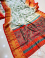 Smashing Off White Banarasi Silk Saree With Enticing Blouse Piece