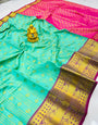 Staring Turquoise Soft Banarasi Silk Saree With Elision Blouse Piece