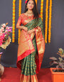 Dissemble Green Kanjivaram Silk Saree With Beauteous Blouse Piece