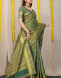 Sizzling Dark Green Kanjivaram Silk Saree With Scintilla Blouse Piece