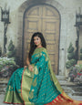 Diaphanous Firozi Banarasi Silk Saree With Flameboyant Blouse Piece