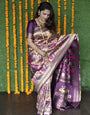 Demure Purple Paithani Silk Saree With Brood Blouse Piece