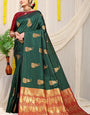 Unique Dark Green Banarasi Silk Saree With Engrossing Blouse Piece