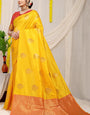 Adorning Yellow Banarasi Silk Saree With Adorable Blouse Piece