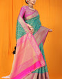 An insanely Rama Kanjivaram Silk Saree With Woebegone Blouse Piece